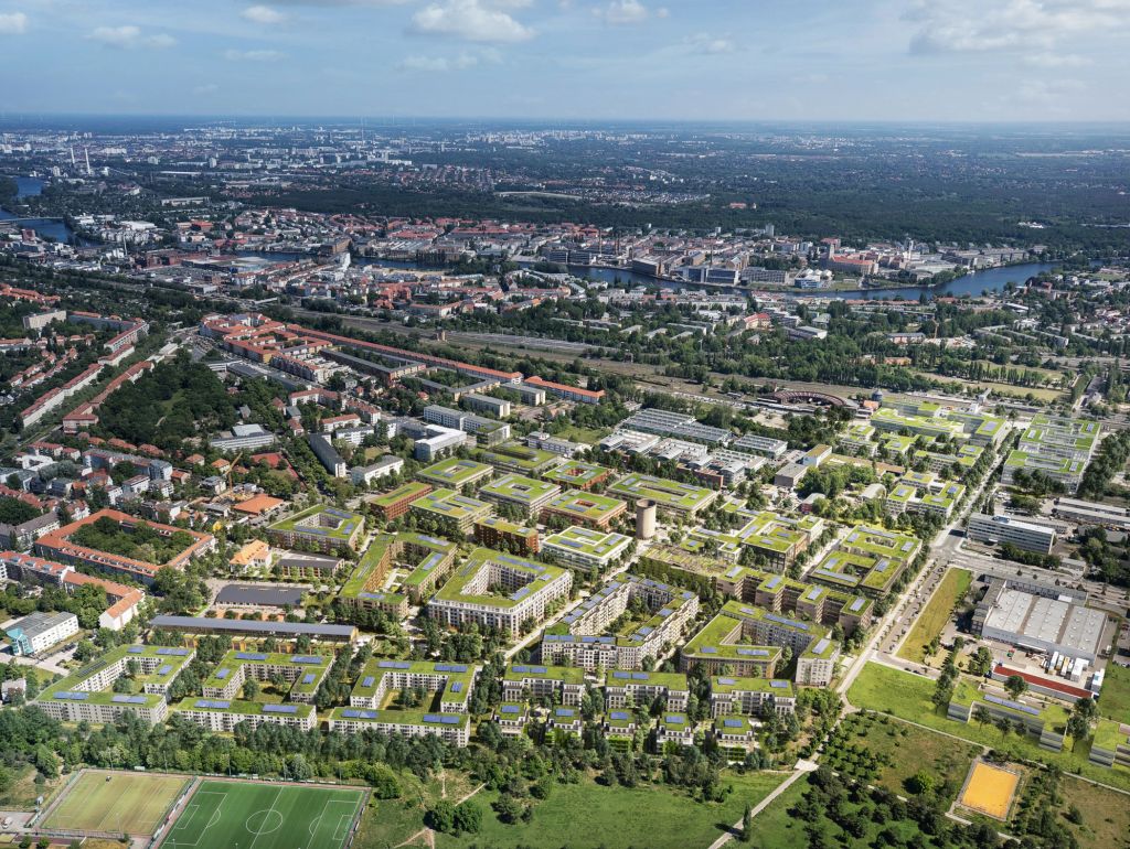 Luftaufnahme von Berliner Ortsteil Johannisthal, mit Visualisierung der zukünftigen Bebauung des Segelflieger Quartiers.