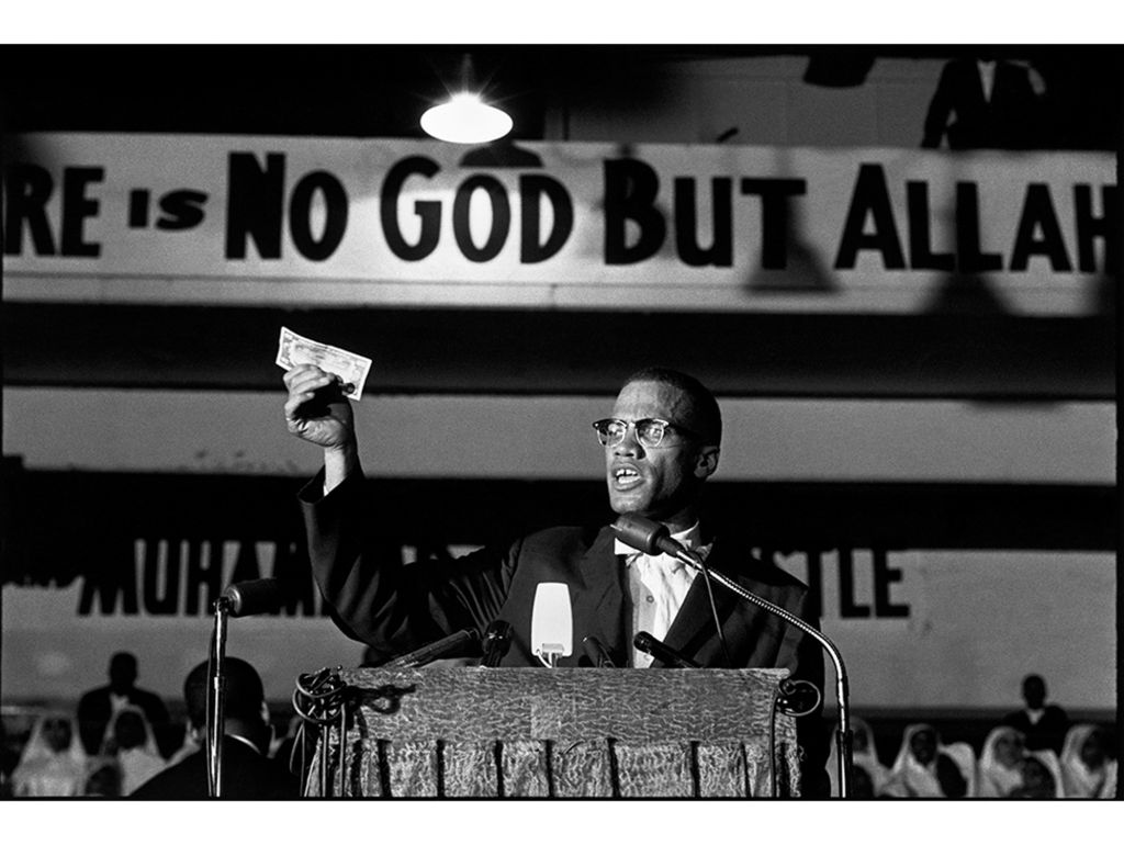 Malcom X am Rednerpult